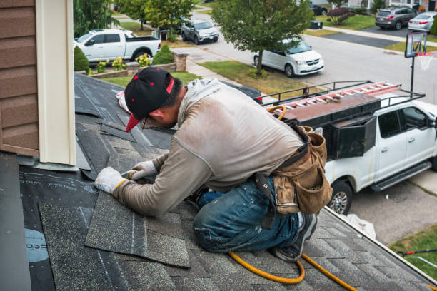 Professional Metal Roofing technician working in Laconia, NH